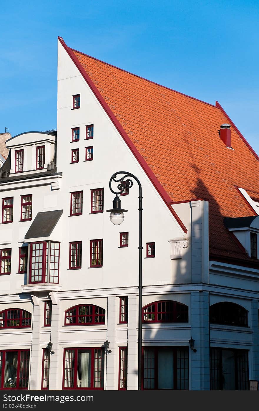 Beautiful old house in historical center of Riga, Latvia. Blue sky in background. Beautiful old house in historical center of Riga, Latvia. Blue sky in background.