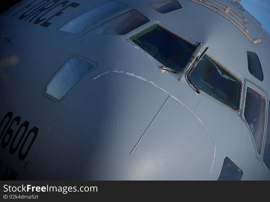 A close-up showing the nose of an Air Force cargo jet. A close-up showing the nose of an Air Force cargo jet