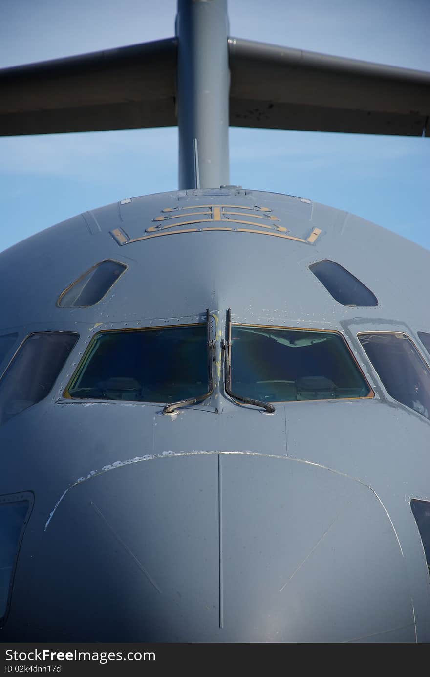 A close-up showing the nose and tail of an Air Force cargo jet. A close-up showing the nose and tail of an Air Force cargo jet