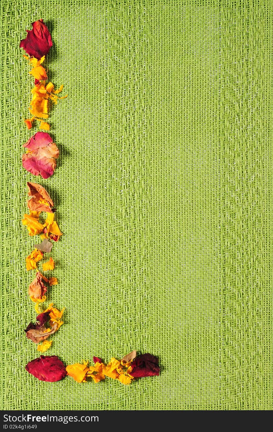 Floral textured place mate on brown table. Floral textured place mate on brown table.