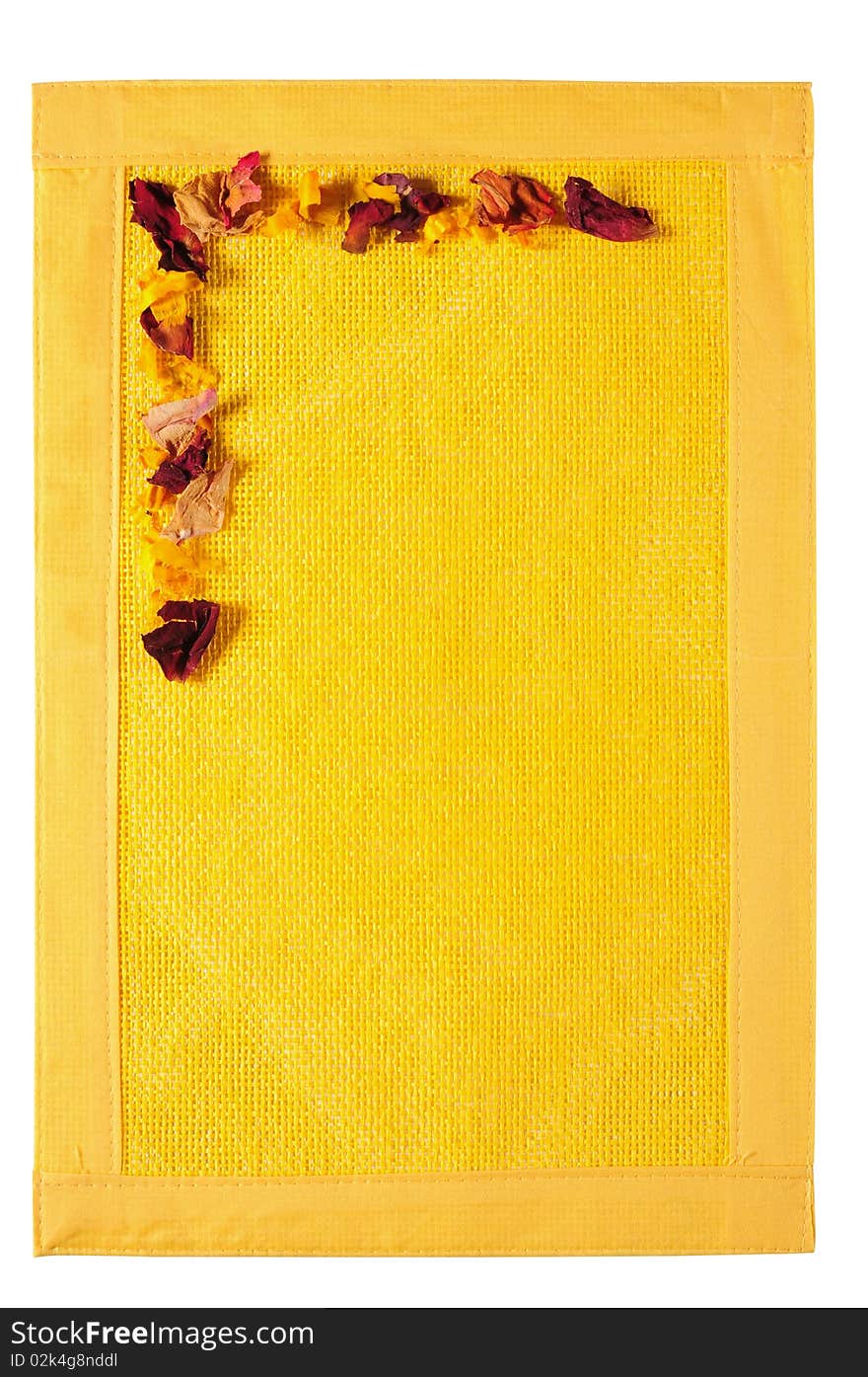 Dried rose petals on vibrant yellow texture. Dried rose petals on vibrant yellow texture.