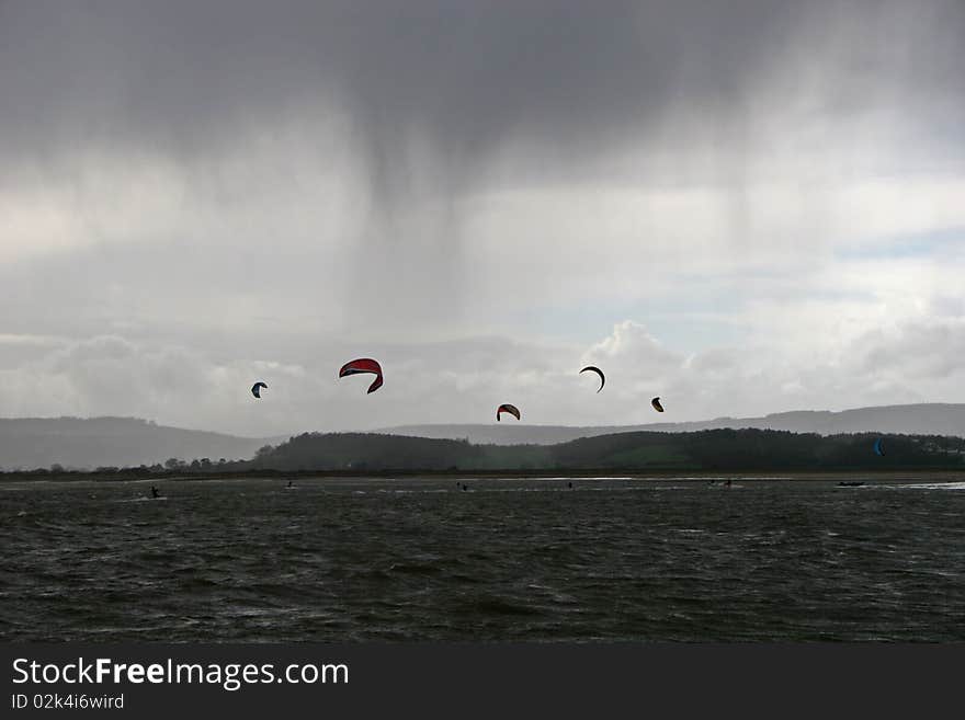 Kitesurfers in storm