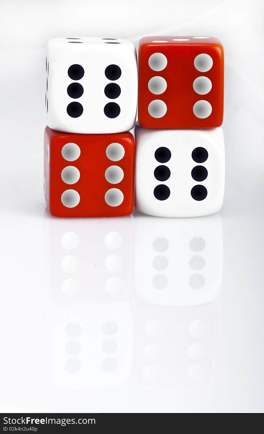 White and red dice counters on white background