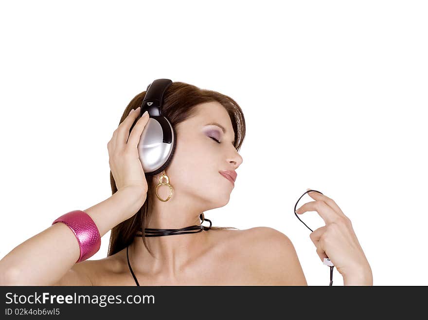 Beautiful brunette woman enjoying music. Beautiful brunette woman enjoying music