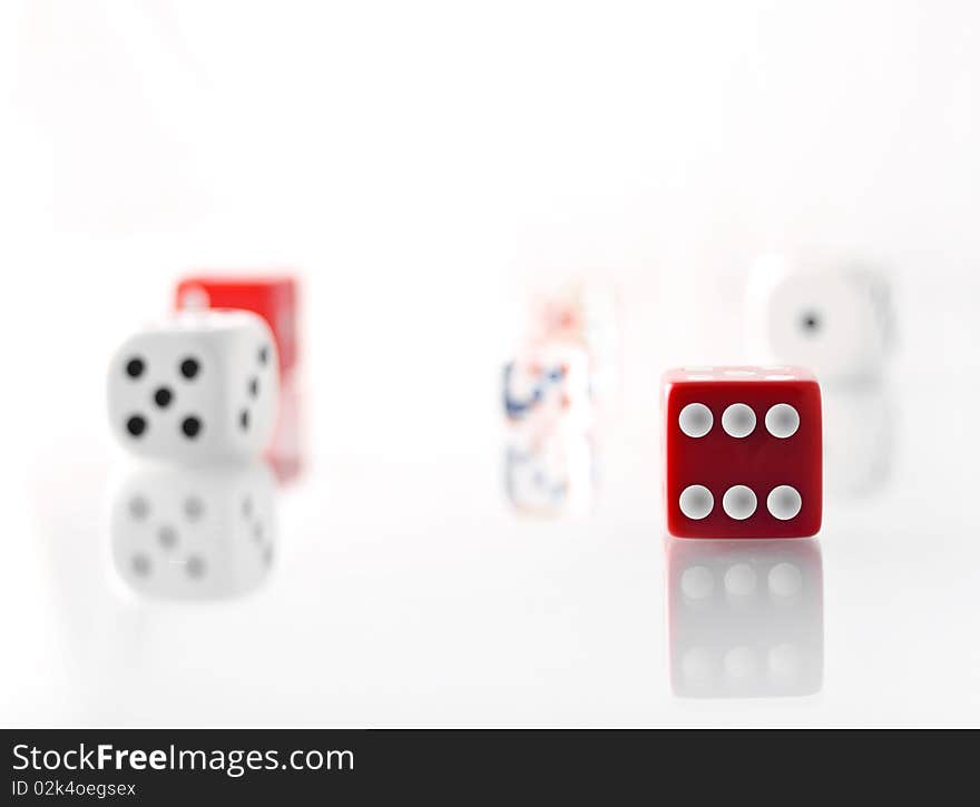 Red and white dice counters on white background