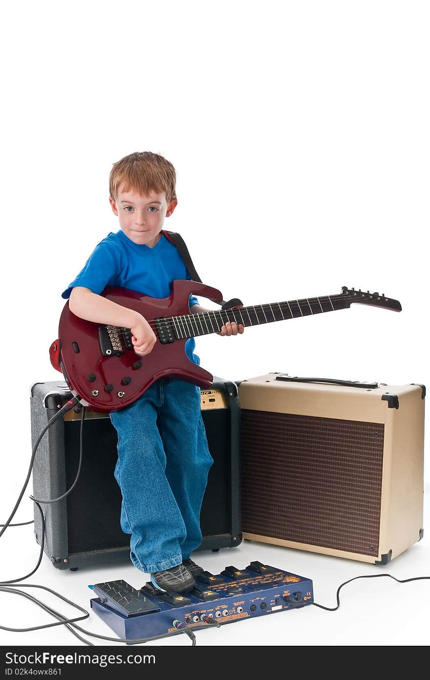 Five year old rockstar playing his guitar