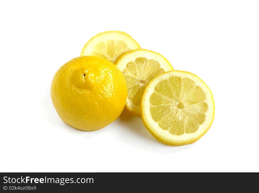 Three fresh lemon slices on white background