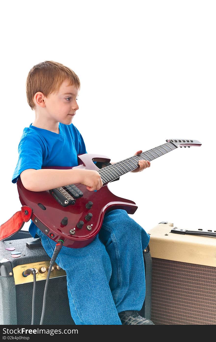 Five year old rockstar playing his guitar