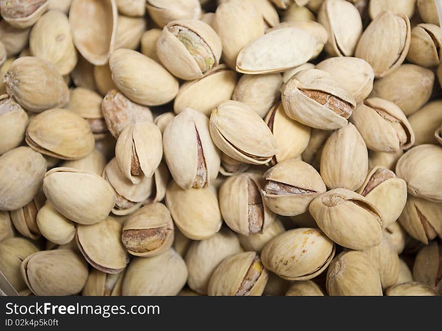 Pistachio nuts isolated on white