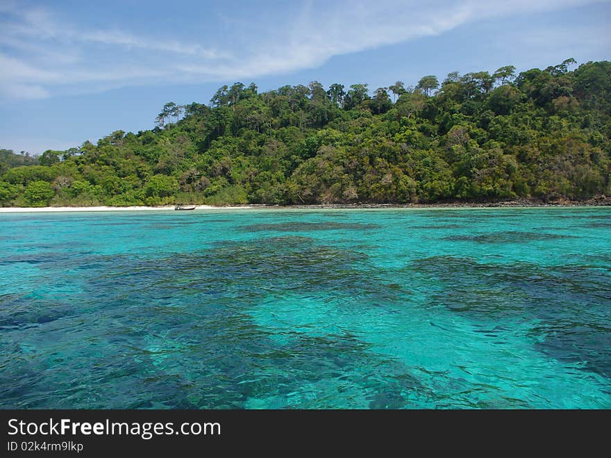 A good view of the blue water front of a island named kho rok without human life, in water a great corral reef. A good view of the blue water front of a island named kho rok without human life, in water a great corral reef.