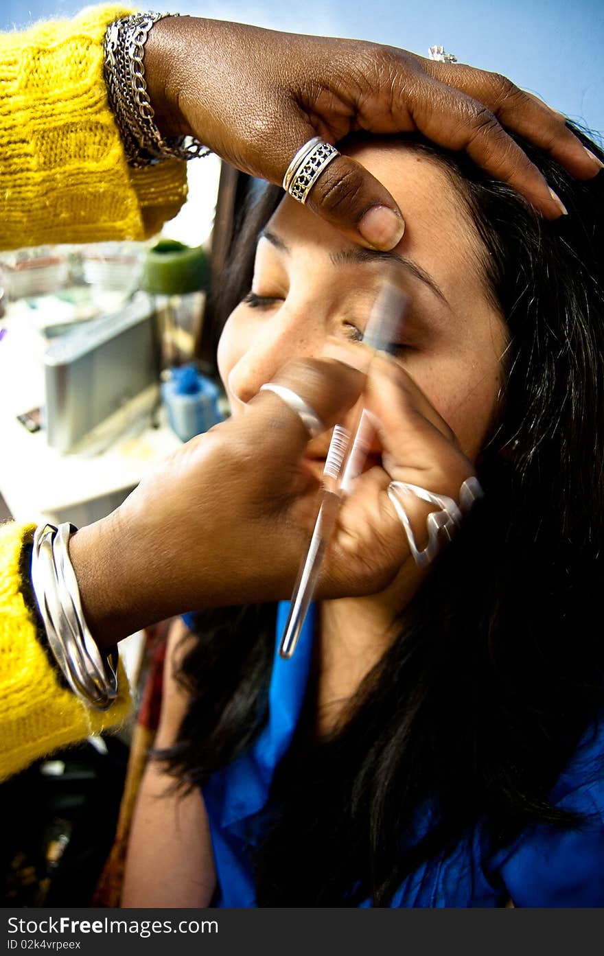 This is client having make professionally applied by a make up artist. This is client having make professionally applied by a make up artist.