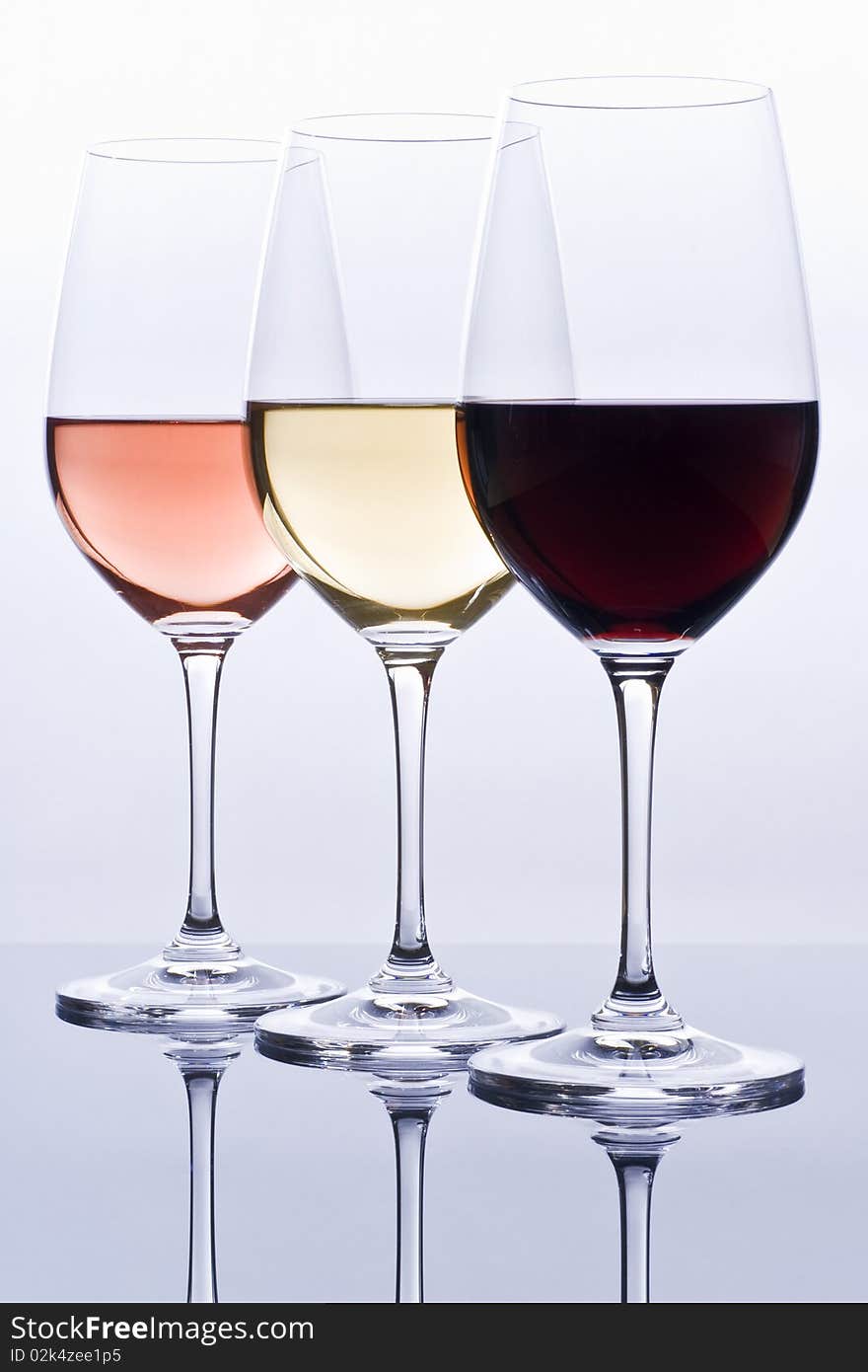 Wineglasses Filled with Colorful Wine