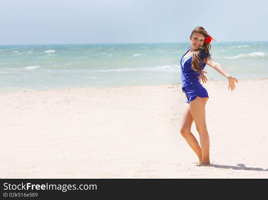 Happy Girl On Beach