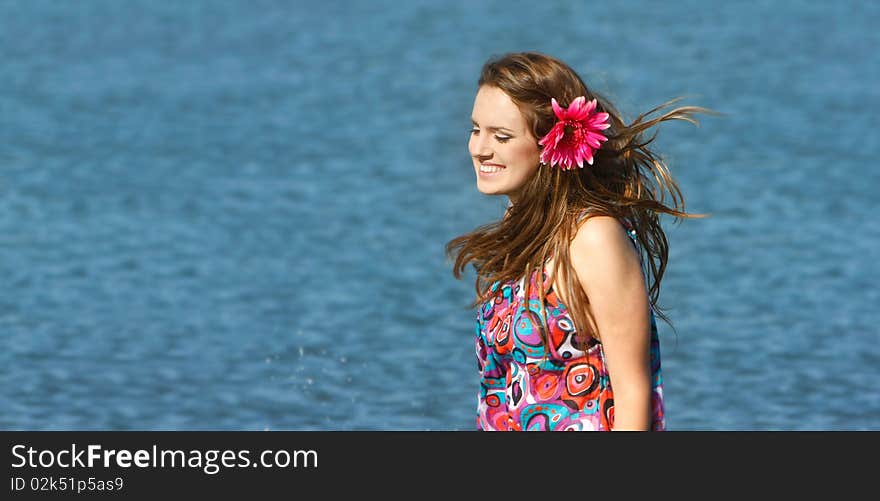 Happy girl on sea background