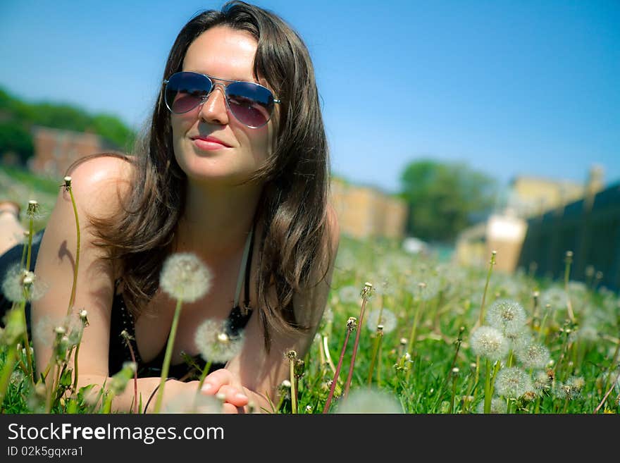 Girl laying down in grass