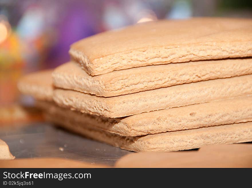 Stack of Gingerbread pieces on tray. Stack of Gingerbread pieces on tray