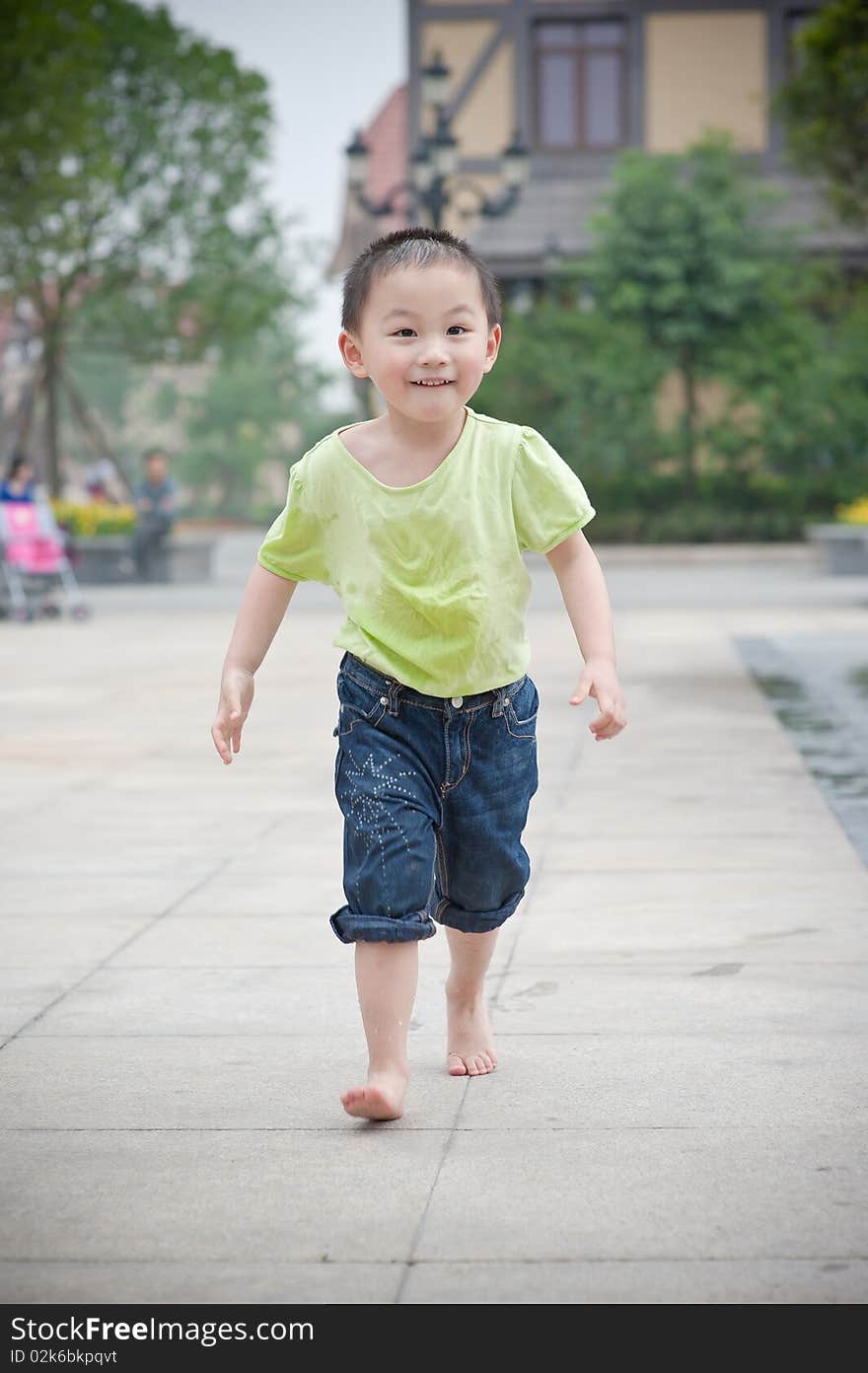 Cute asian boy is running. Cute asian boy is running