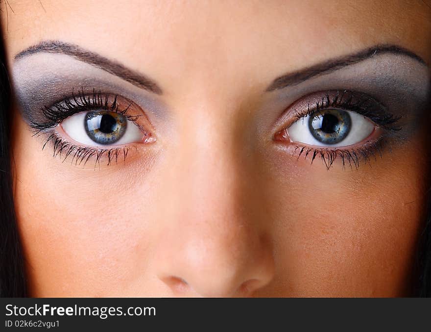 Close-up portrait of young woman with black hair. Close-up portrait of young woman with black hair