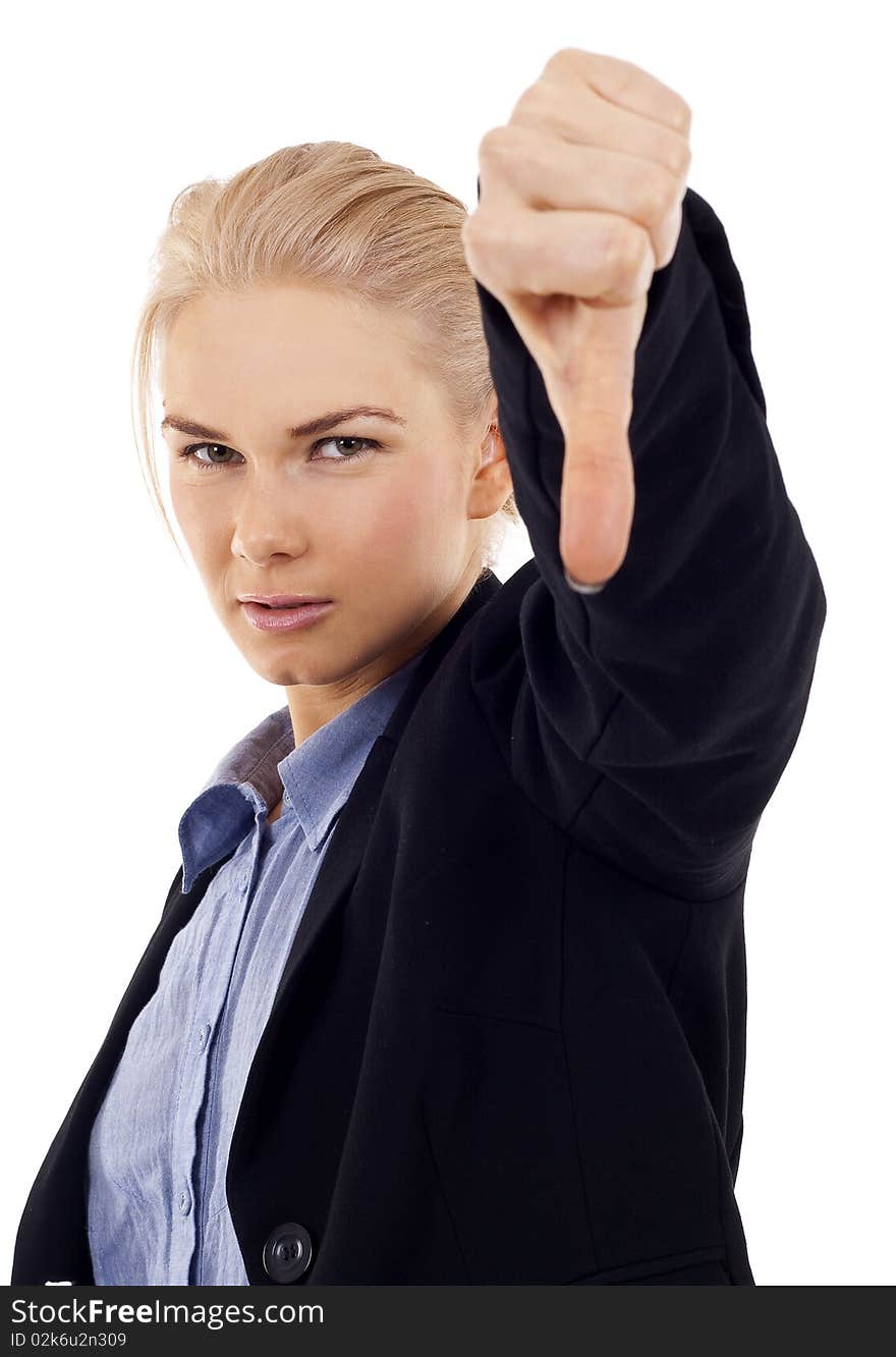 Young woman gesturing thumbs down over white. Young woman gesturing thumbs down over white