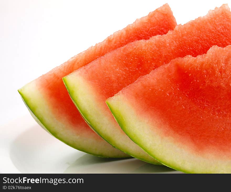 Fresh watermelon. Close up on white background.