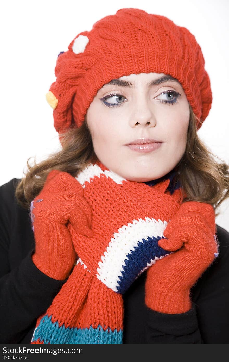 Young pretty warmly clothed woman in studio. Young pretty warmly clothed woman in studio