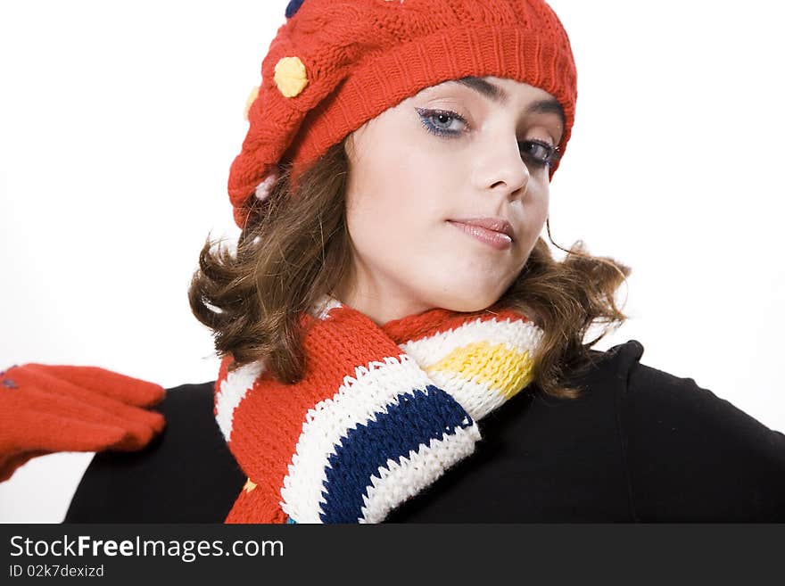 Young pretty warmly clothed woman in studio. Young pretty warmly clothed woman in studio