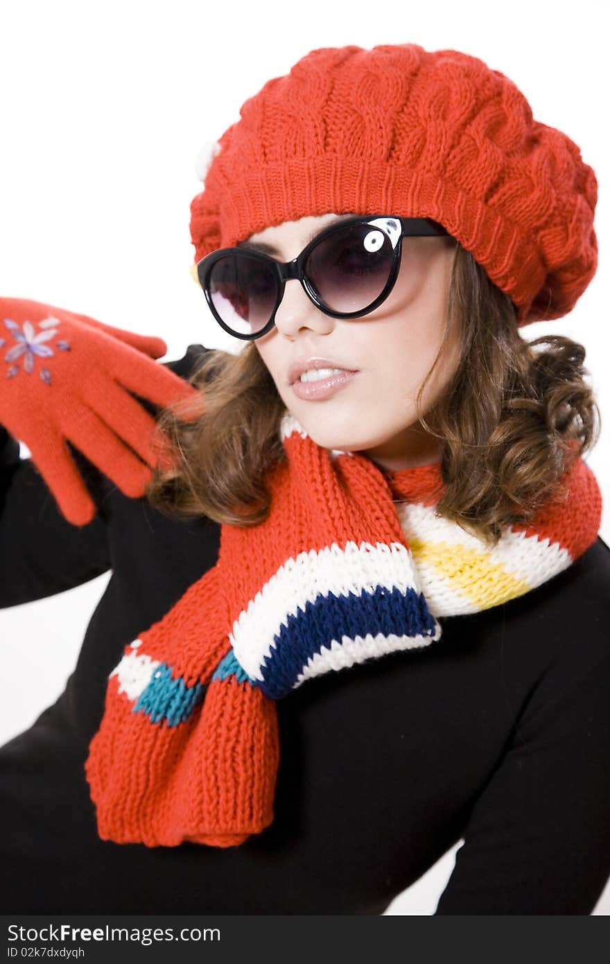 Young pretty warmly clothed woman in studio. Young pretty warmly clothed woman in studio