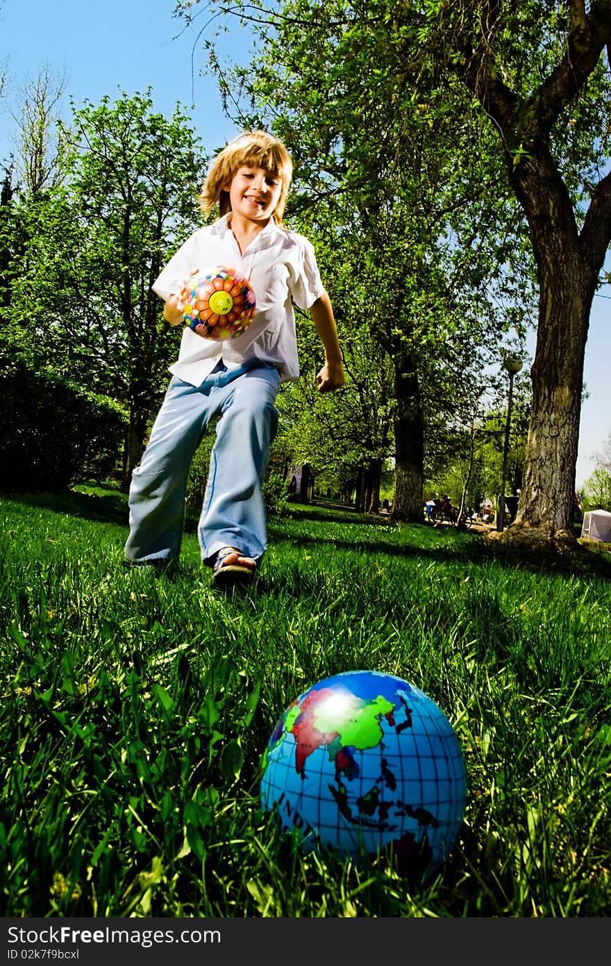 Boy with ball in park