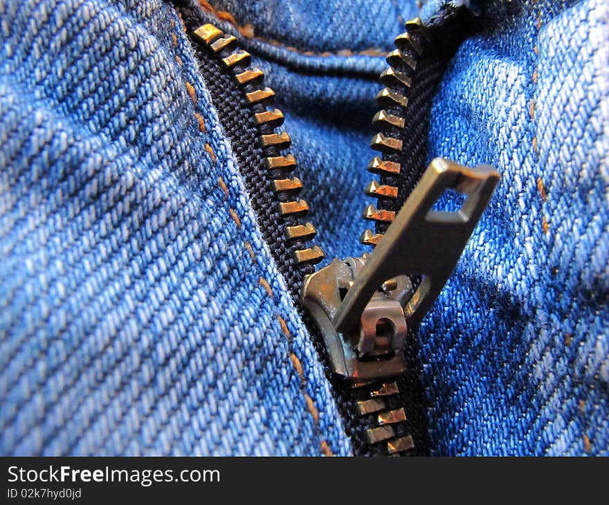 Macro of a jeans's zipper. Macro of a jeans's zipper