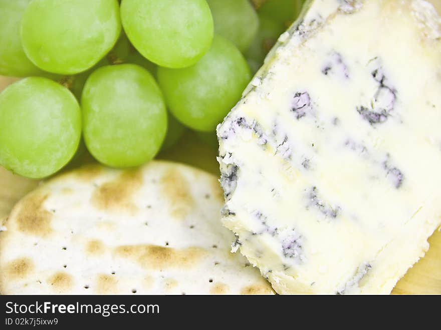 Blue stilton, grapes and crackers. Blue stilton, grapes and crackers