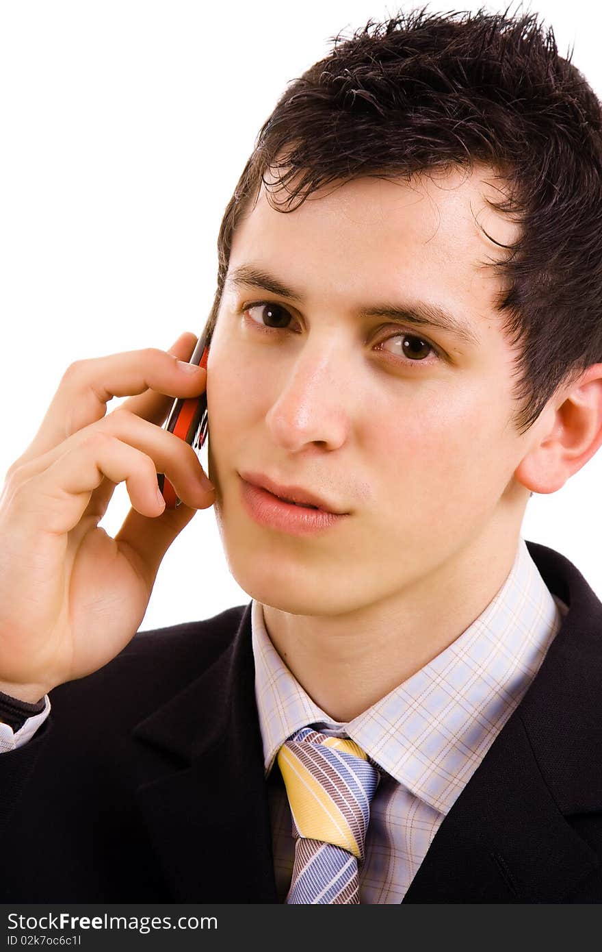 Young business man on the phone, isolated on white background