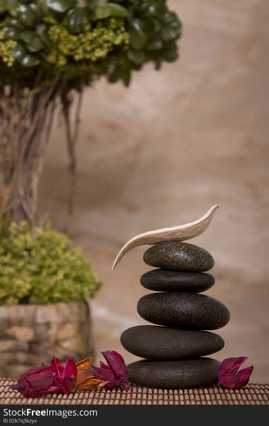 Stack of balanced massage stones