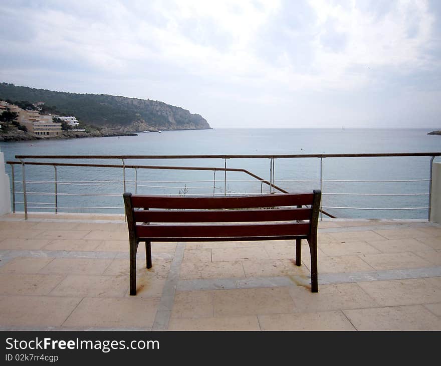 Wooden bench with sea view