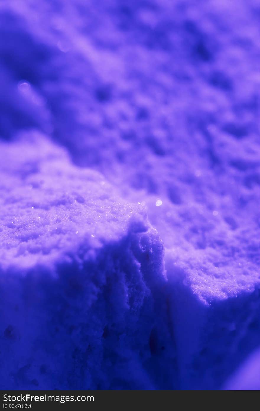 Ultraviolet snow macro shot background (shallow depth of field)