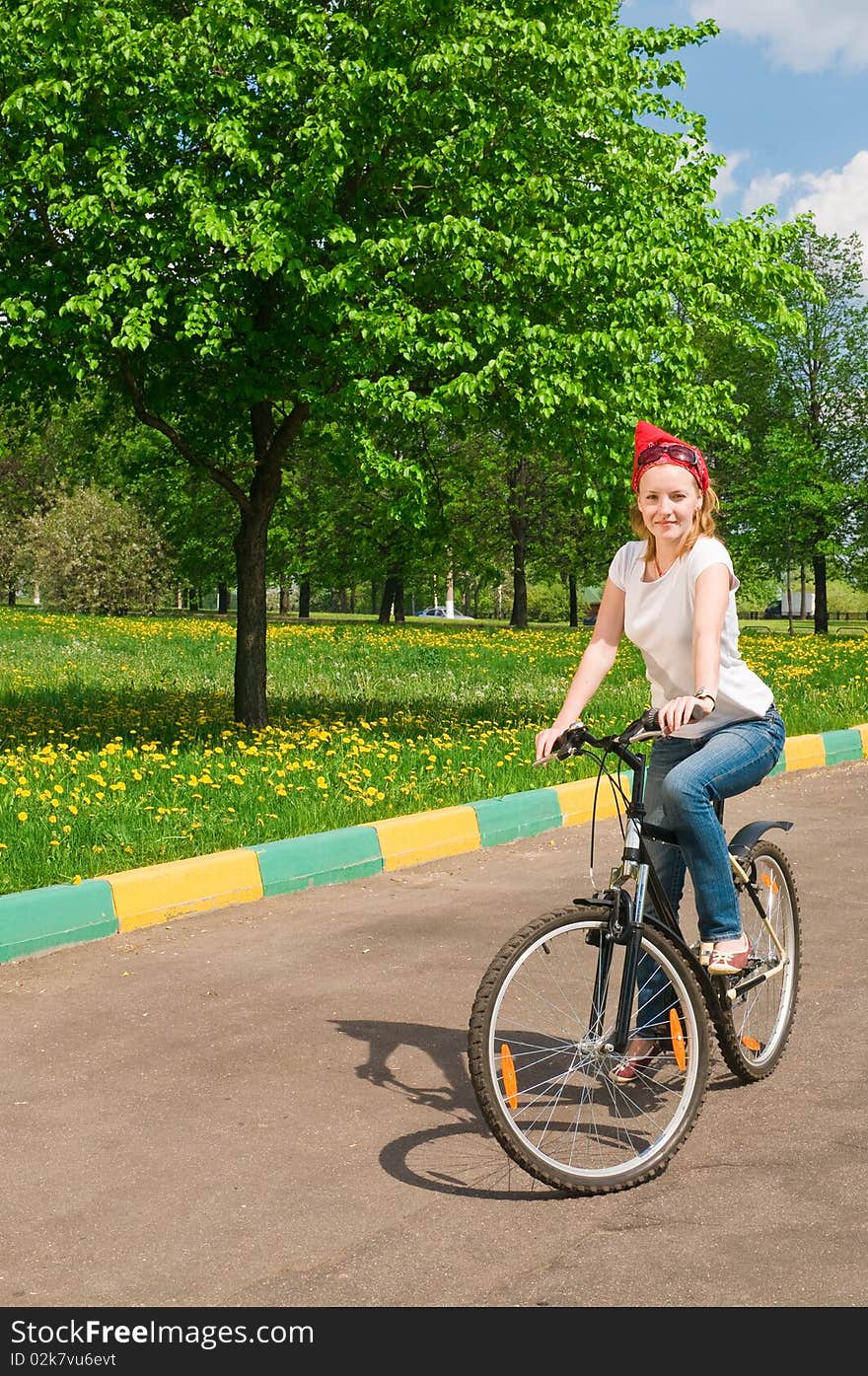 Shoot of young woman with bicycle