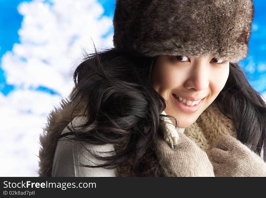 Young Woman Wearing Warm Winter Clothes