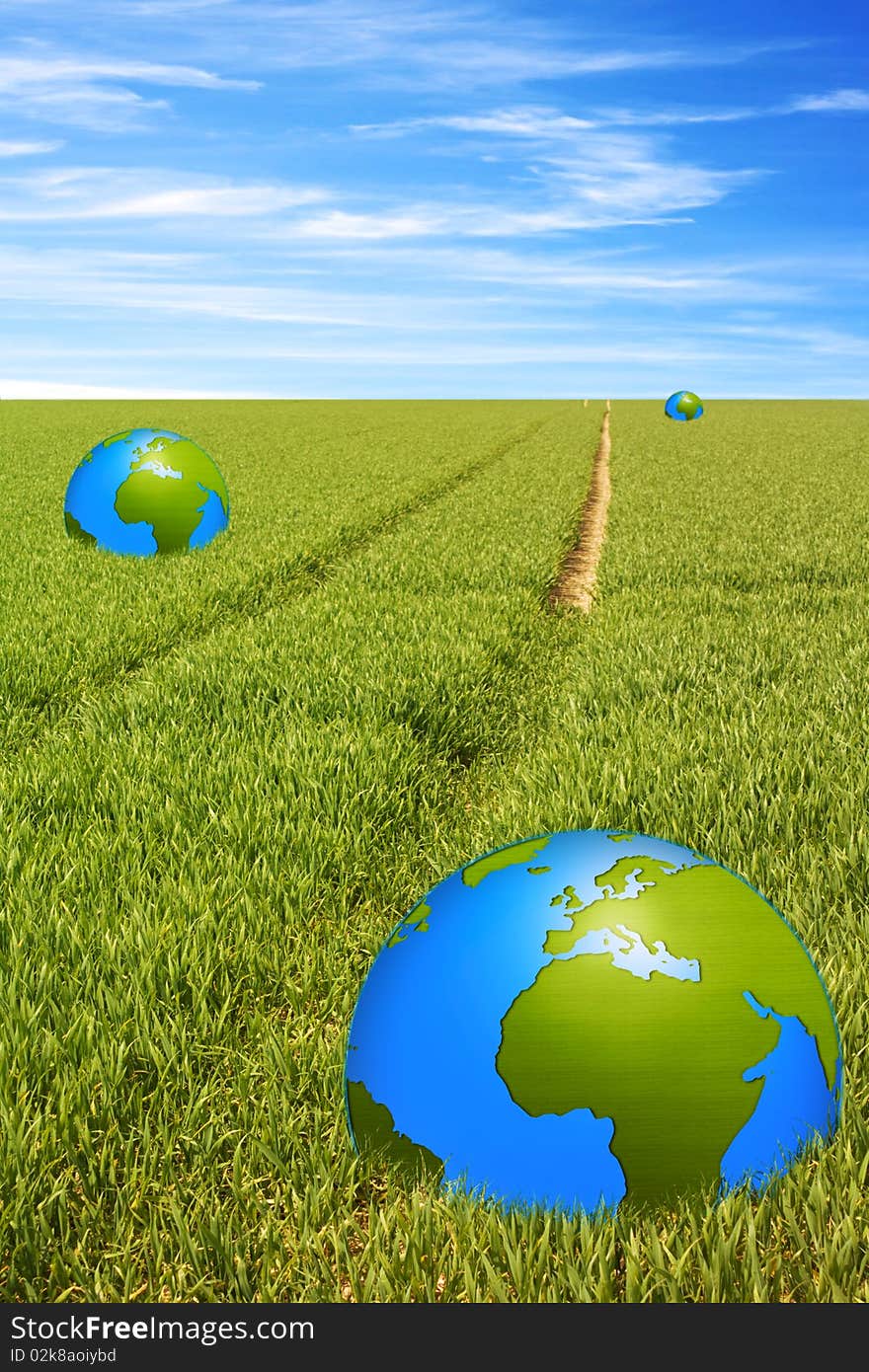 World globe on grass field with a path to the light on horizon with nice sky in background