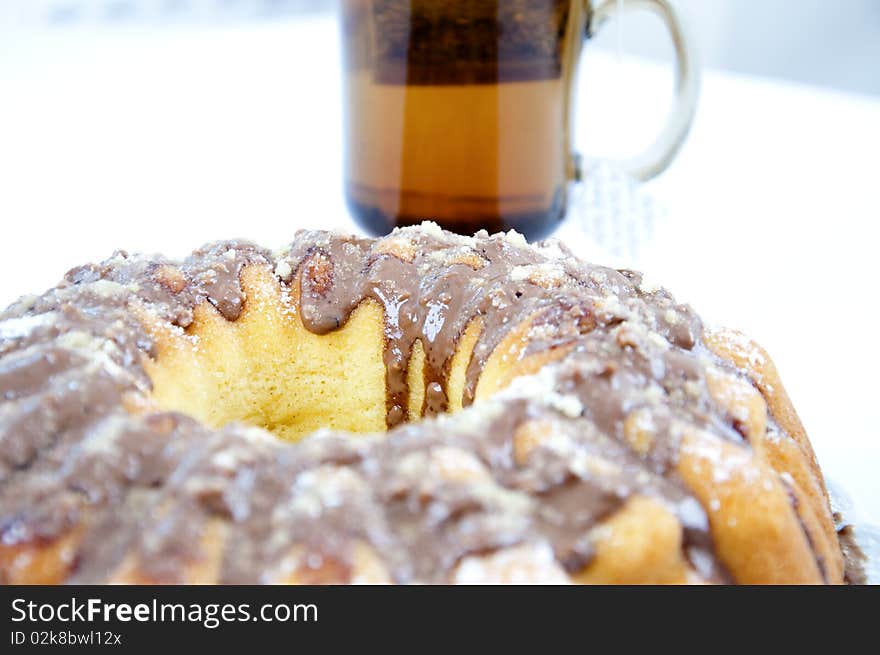 Marble cake on plate with tea. Marble cake on plate with tea