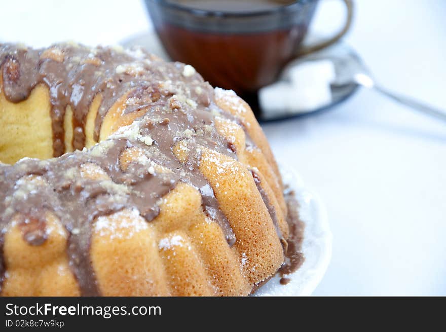 Marble cake on plate with tea. Marble cake on plate with tea