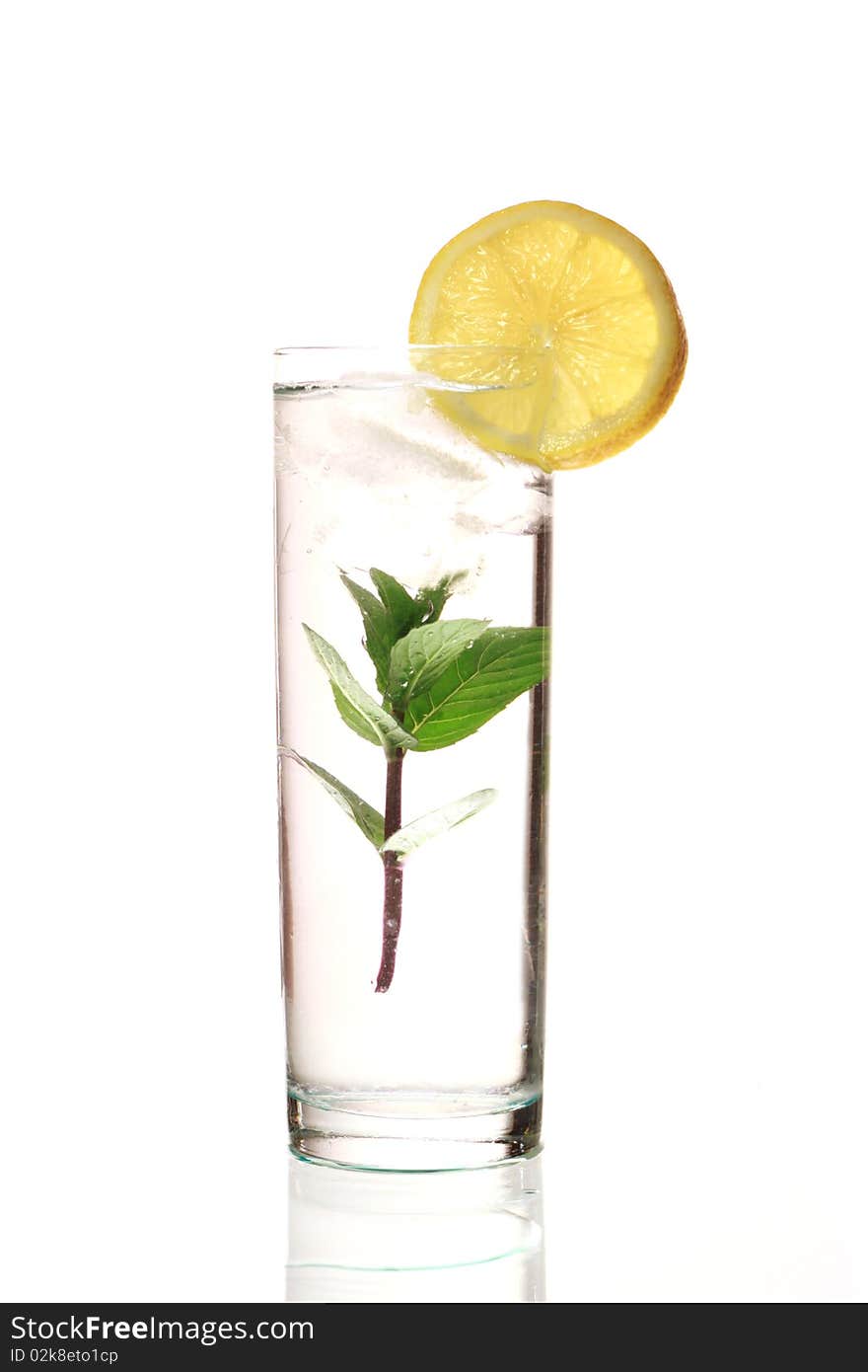 Cold fresh lemonade with lemon and mint