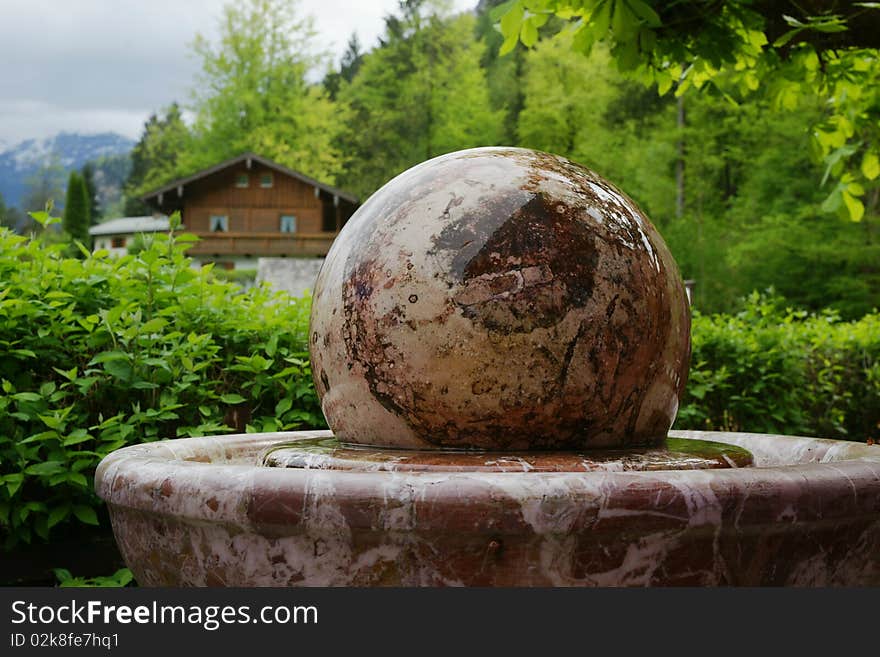 A marble ball rotating in water at Germany's last ball mill near Marktschellenberg, Bavaria, across from Salzburg.