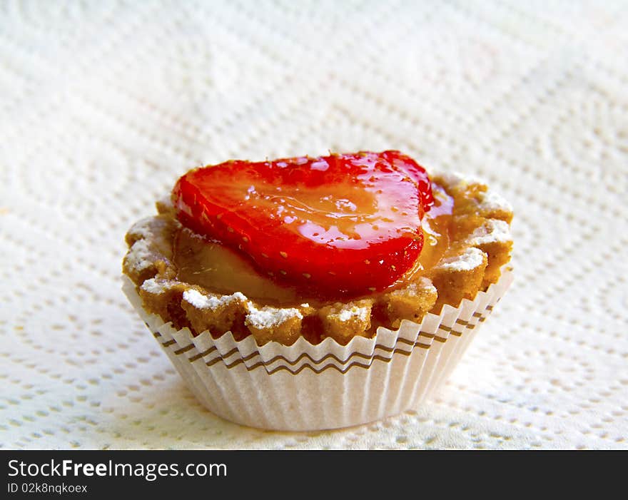 Pie pastry with strawberry on a white background. Pie pastry with strawberry on a white background