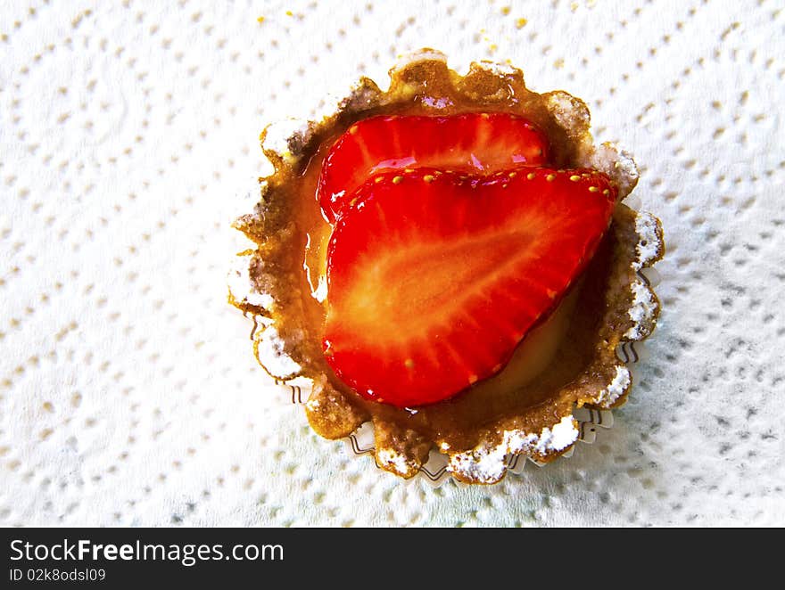 Pie pastry with strawberry on a white background. Pie pastry with strawberry on a white background