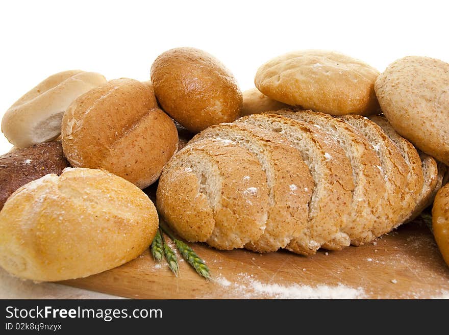 Bread On A Wooden Board Sprinkled With Flour