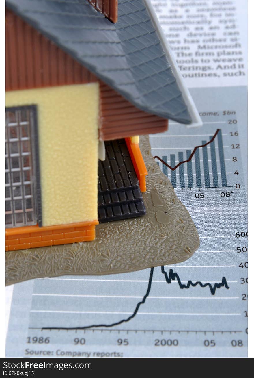 House model and economy information and chart, means analysis about real estate and economy, investment or house building industry