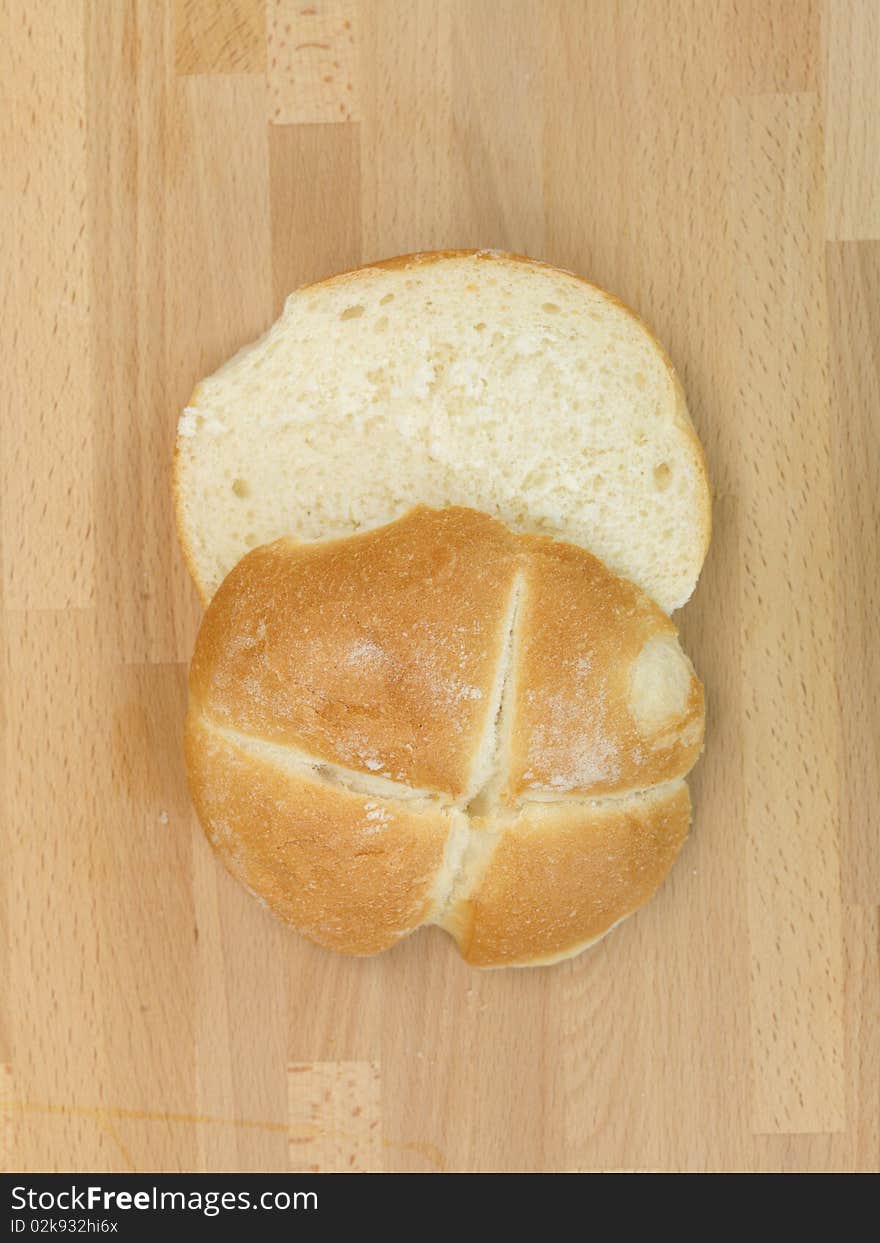 Fresh bread rolls isolated on a kitchen bench