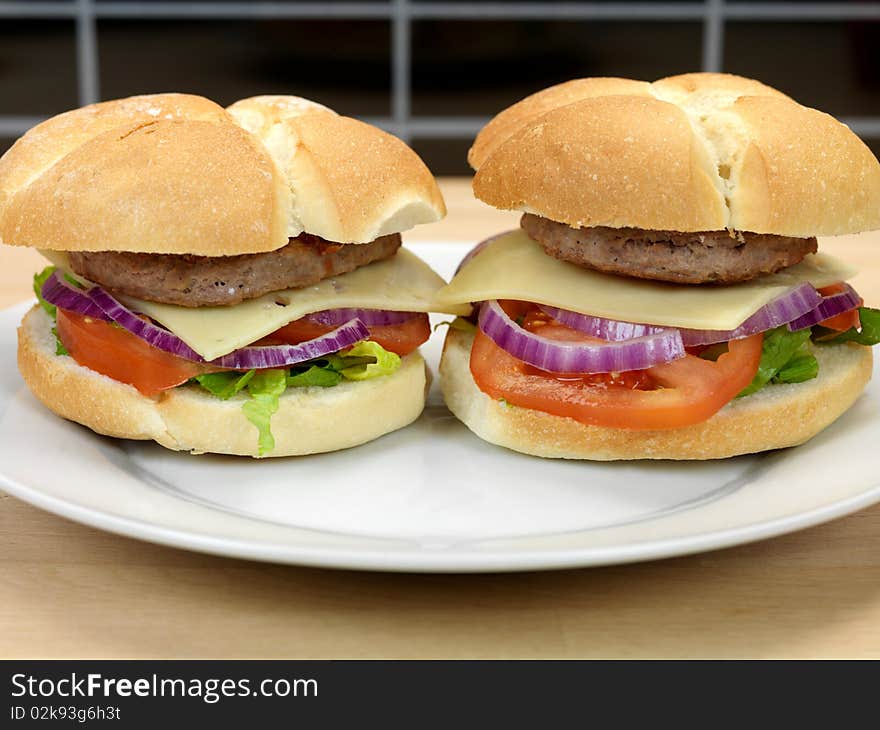 A freshly made American style hamburger with sauce