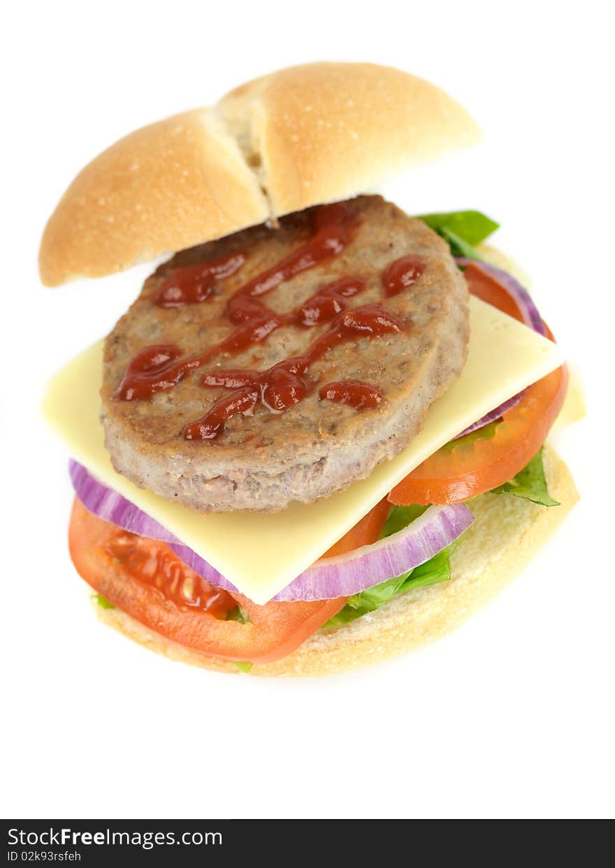 A freshly made American style hamburger with sauce