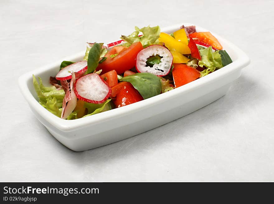 Small dish with radish salad. Small dish with radish salad