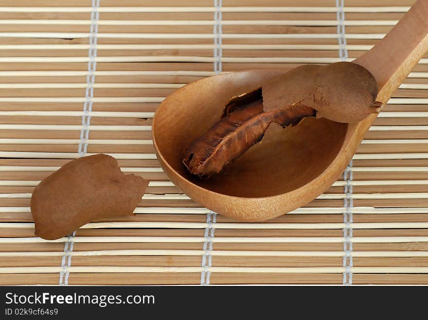 Tamarind fruit cut in two